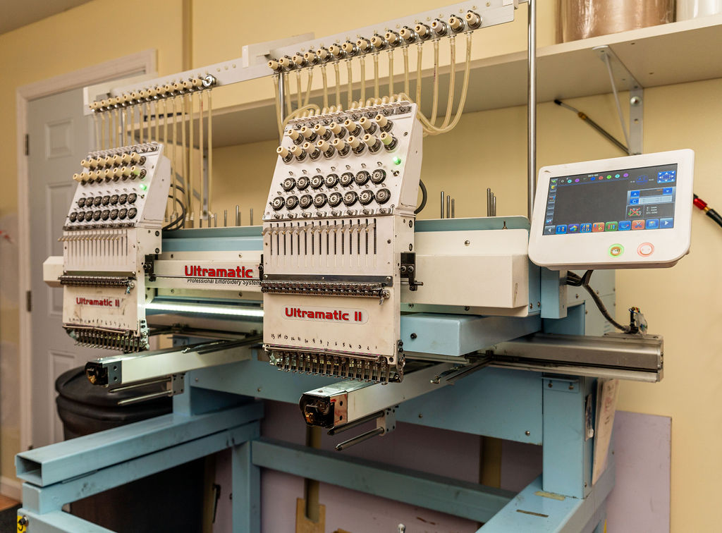 Multi-head Ultramatic embroidery machine at Hilson Ink — Brandywine, MD